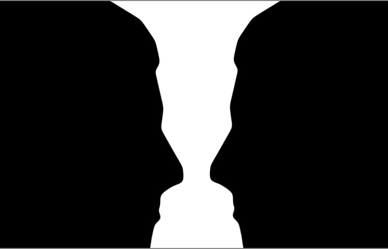 two silhouette profile or a white vase